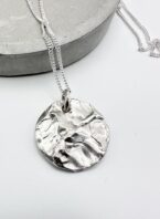 handmade sterling silver textured disc pendant necklace