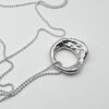 Handcrafter molten silver organic pendant necklace on a silver ball chain, textured and hallmarked artisan jewellery