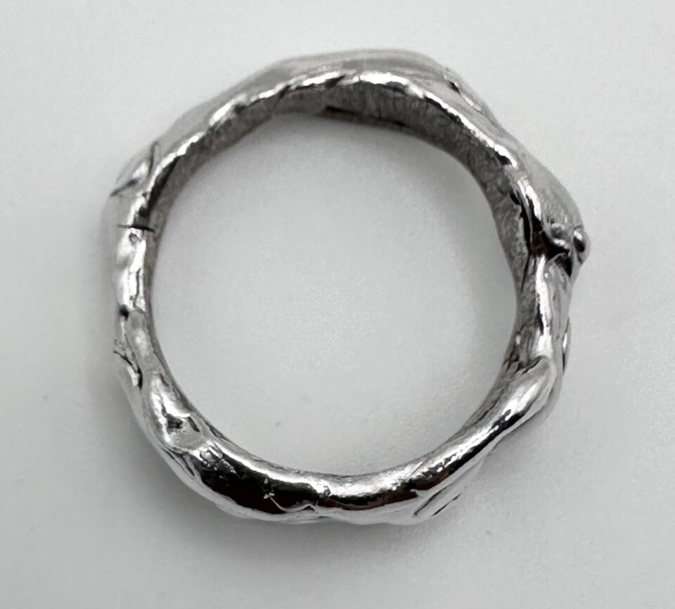 handmade molten silver ring with organic textured band by Bohdee Jewellery