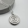“handmade spiral silver pendant necklace melted silver organic texture”